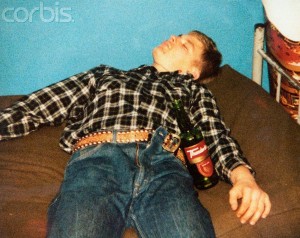The image above shows Jeffrey Dahmer in a drunken sleep one day while he was enlisted in the military. He would later be discharged. (Image Source: www.murderpedia.org)